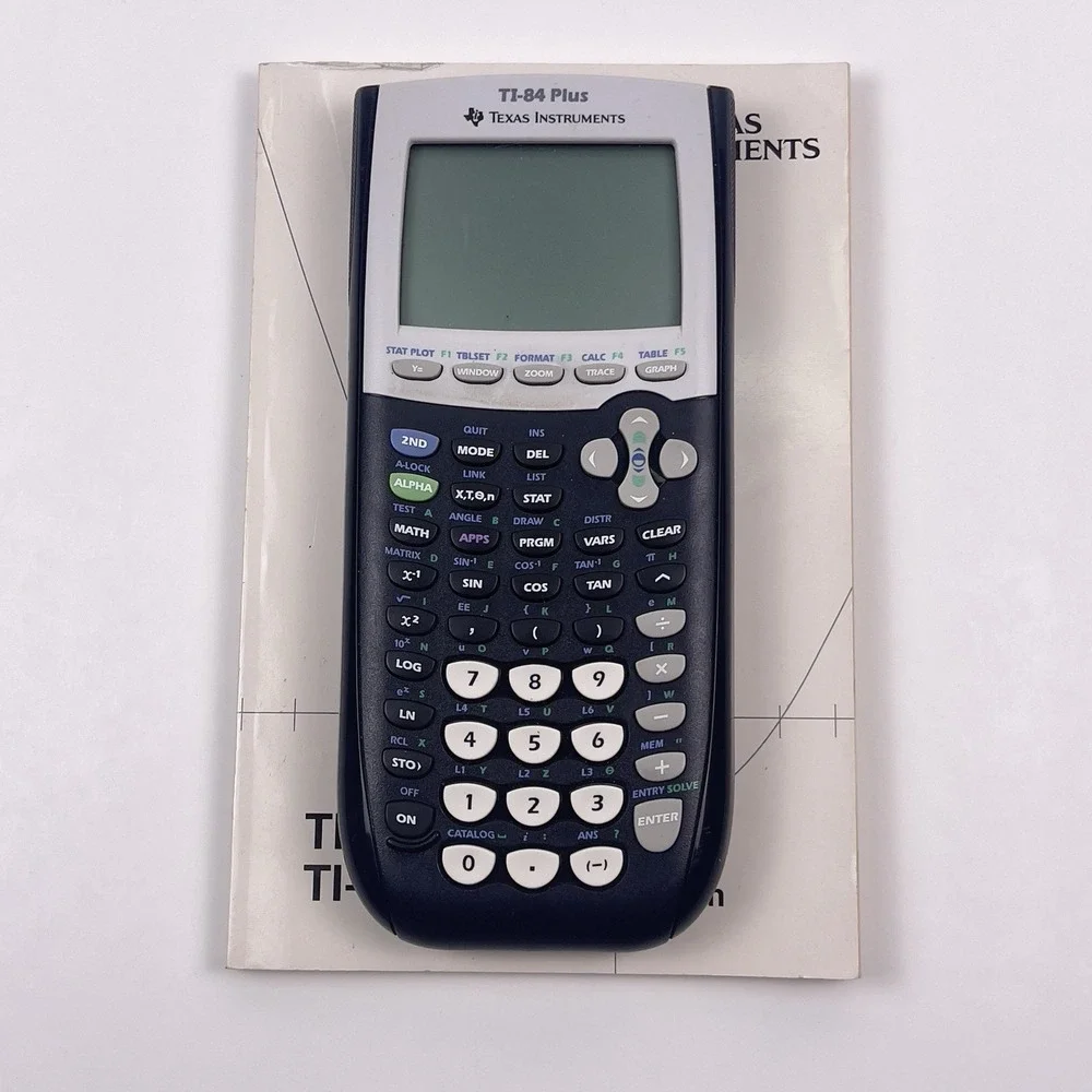 Texas Instruments TI-84 Plus Graphing Calculator w/Manual Tested Powers On Read!